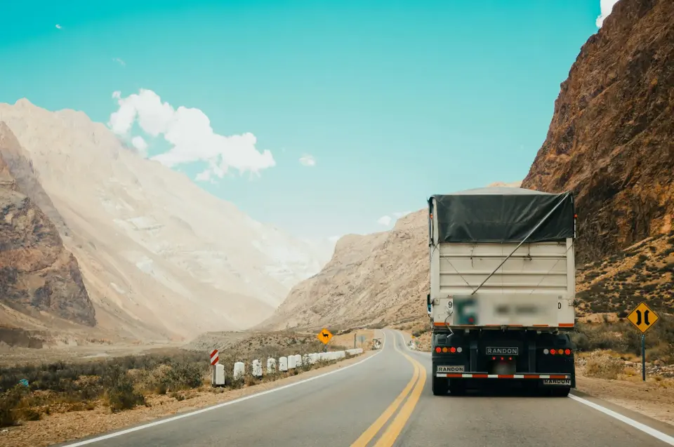 Truck on a mountain highway – cross-border road transport
