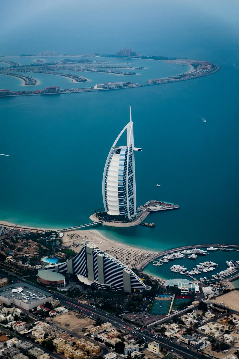 Dubai coastline from above – road transportation in the UAE and Oman